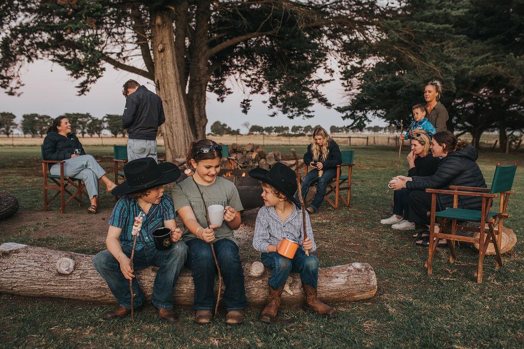 Kids and Adults enjoying Open Fire Pit - Barooma Homestead